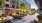 a courtyard with a building and trees