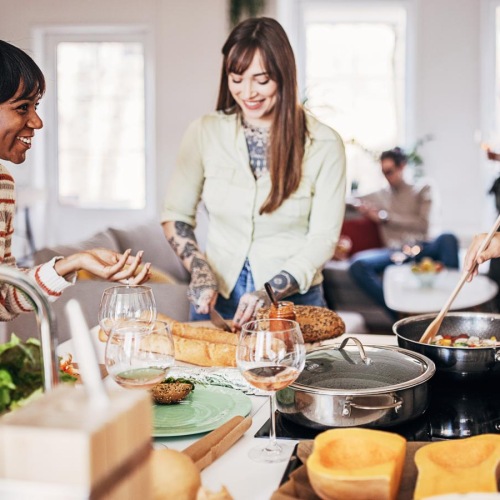 a group of women in a kitchen