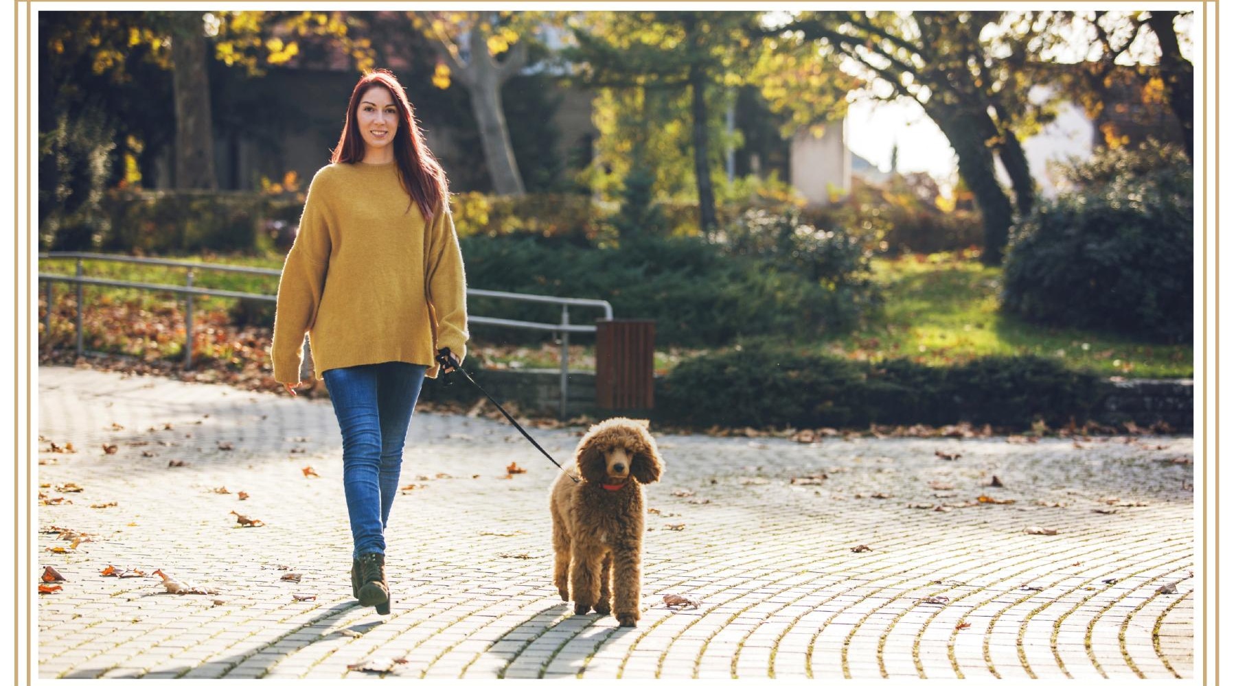 a woman walking a dog