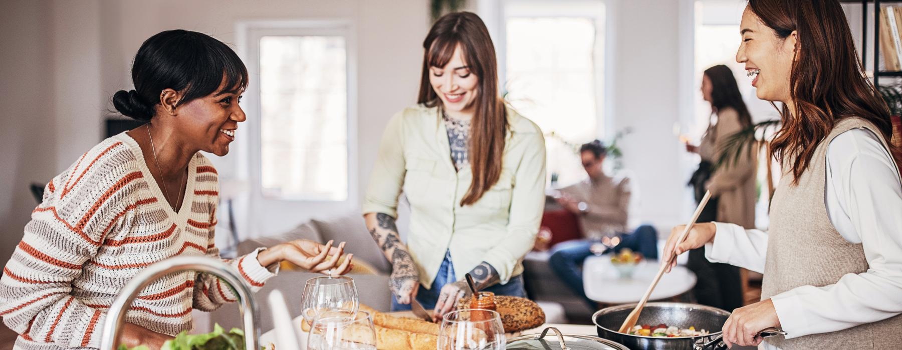 a group of women in a kitchen